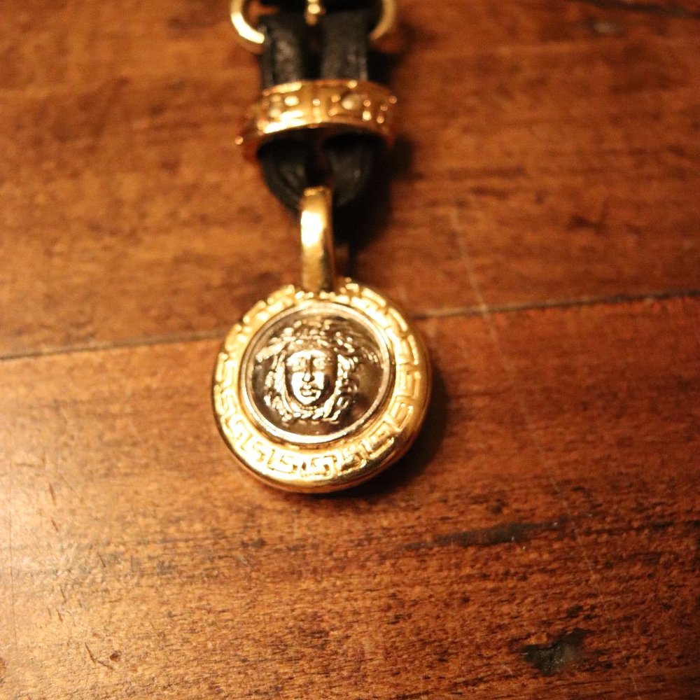 Gianni Versace Keychain - black leather and gold tone metal.